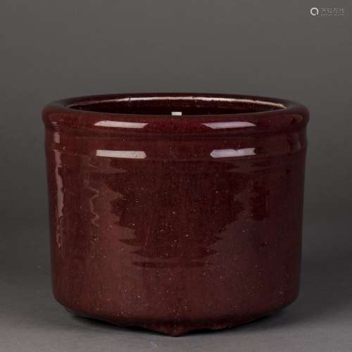 A CHINESE COPPER RED GLAZED BRUSH POT