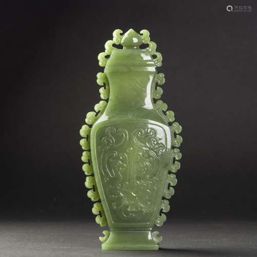 A GREEN JADE FLATTENED VASE AND COVER