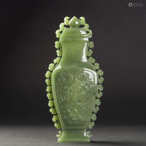 A GREEN JADE FLATTENED VASE AND COVER