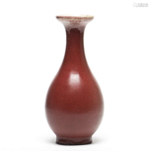 A RED GLAZED PEAR-SHAPED VASE