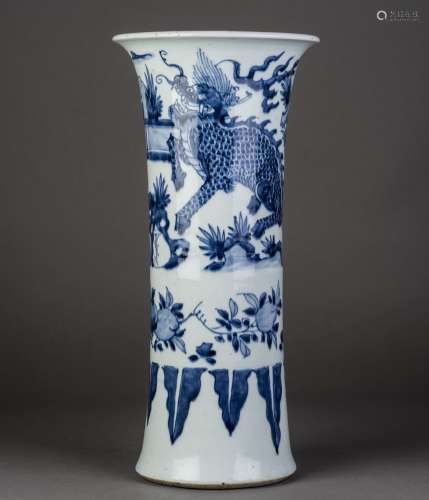 A CHINESE BLUE AND WHITE BEAKER VASE