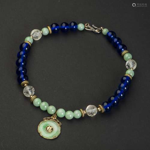 A STRAND OFJADEITE BEADS NECKLACE AND PENDANT