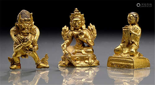 A GROUP OF THREE GILT-BRONZE FIGURINES: A WORSHIPPER, DHARMARAJA AND SYAMATARA, TIBETO-CHINESE, late 18th ct