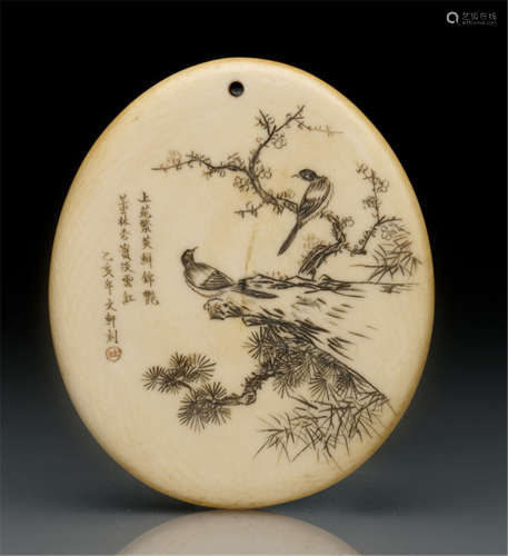 A CARVED IVORY BADGE WITH A LONG POEM AND A DEPICTION OF BIRDS