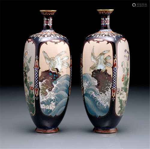 A PAIR OF POLYCHROME CLOISONNÉ ENAMEL VASES, Japan, signed Yamamoto zô, Meiji period, decorated with four cartouches containing various flowers and an eagle on a rock - Provenance: Purchased from Nagel Auktionen, Stuttgart, Sale 9A, 11.11.1995, no. 139 - Minor wear