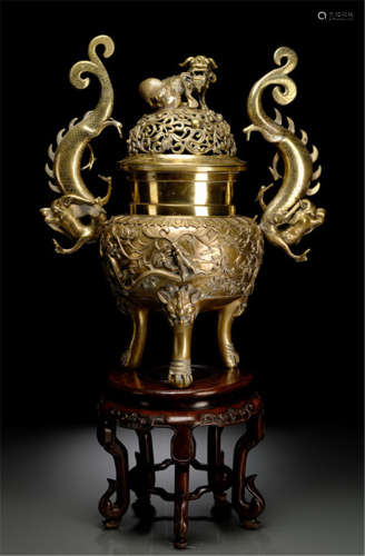 A BRASS-COLOURED BRONZE CENSER WITH LONG CURVED DRAGON HANDLES