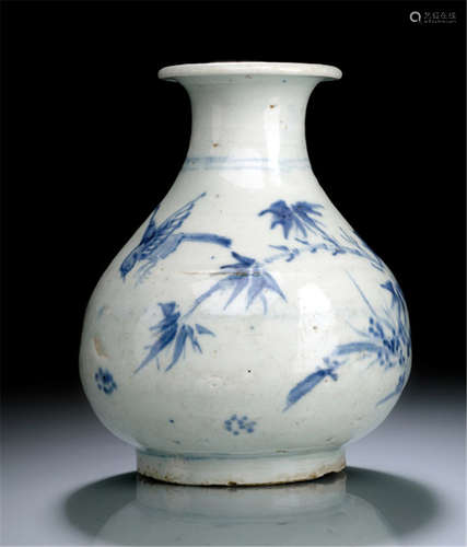 A PORCELAIN VASE WITH UNDERGLAZE BLUE DECORATIONS, Korea, mid Yi Dynasty, depicting a bird and a rock with blossoms of peonies and bamboo sprays - Small restored chip and hairline crack to rim, partly minor traces of age, stand slightly chipped