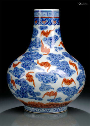 A BLUE AND WHITE AND IRON-RED DECORATED BAT AND CLOUD VASE