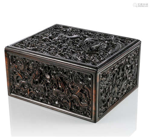 A FINELY CARVED HARDWOOD BOX AND COVER WITH DRAGONS AND CLOUD DECOR