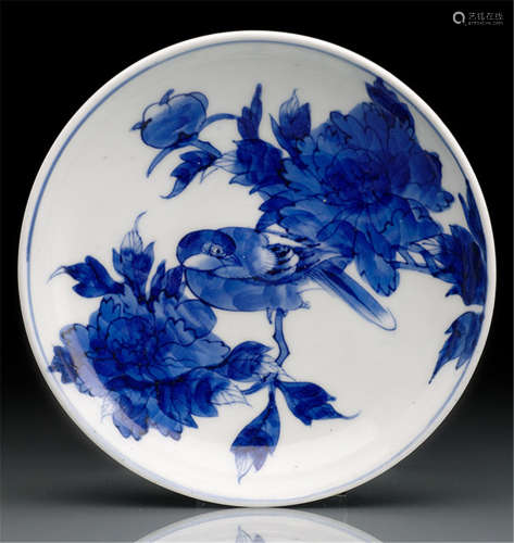 A SMALL PORCELAIN DISH, Japan, Arita, underglaze blue four-character mark, 18th Ct., decorated in underglaze blue depicting a bird on a spray with peonies - Property from an old German private collection, acquired before 1990 - Minor wear