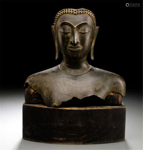 A BRONZE BUST OF BUDDHA SHAKYAMUNI, Thailand, Ayutthaya Period, 17th Ct. - Provenance: Collection Adalbert Colsman (1886-1978) by descent to the present owner - Damages due to age, wood stand