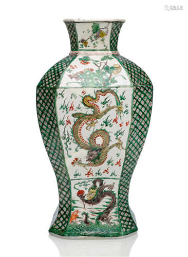AN OCTAGONAL VASE WITH DRAGONS AND CARPS IN 'FAMILLE VERTE'-COLOURS