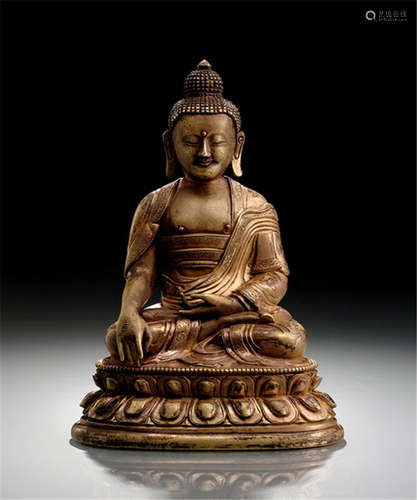 A GILT-BRONZE FIGURE OF BUDDHA SHAKYAMUNI, TIBETO-CHINESE, 18th ct