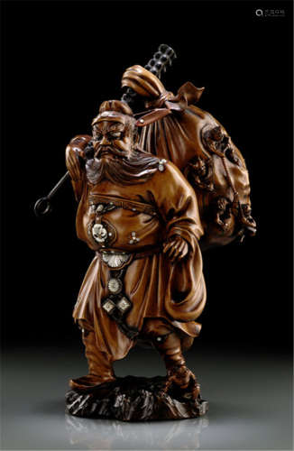 A WOOD OKIMONO OF SHÔKI, Japan, Signed Kôgetsu, Meiji period, carved in standing posture, with fierce facial expression, carrying a large bag on his back filled with 'oni' trying to jump out to escape, details inlaid in ivory and mother-of-pearl - Purchased from Nagel Auktionen, Sale 4A, 19.06.1993, lot 2452 - Minor wear, partly only few age cracks