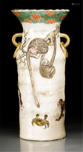 AN UNUSUAL SATSUMA VASE, Japan, signed Dai Nihon Kinkôzan zô, Meiji period, decorated with a group of four monkeys, two swinging on a prunus spray, trying to reach for a crab and a group of three dogs playing and romping about - Property from a South German private collection, acquired before 1970 - Property from a Berlin private collection - Minor wear, rest.