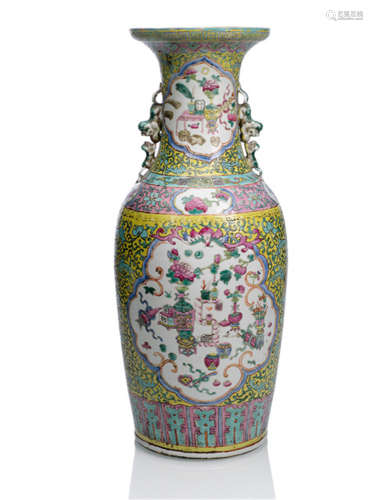 A FAMILLE ROSE VASE WITH ANTIQUES ON YELLOW GROUND