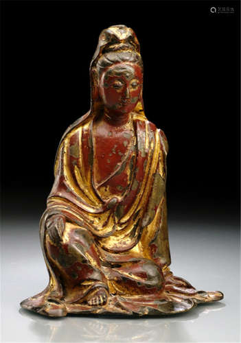 A GILT- AND RED-LACQUERED BRONZE FIGURE OF GUANYIN