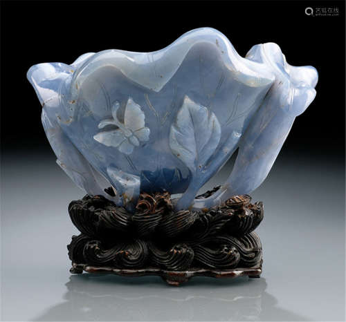A WELL CARVED AGATE BRUSH WASHER ON A CARVED HARDWOOD STAND, China, 19th ct