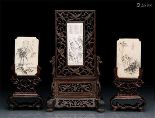 THREE IVORY PLATES WITH MINIATURE CARVINGS OF LANDSCAPES AND FIGURES