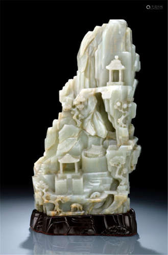 A FINE AND LARGE INSCRIBED CELADON JADE MOUNTAIN WITH A POEM OF THE QIANLONG EMPEROR, China, Qianlong period