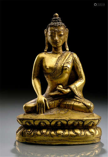 A GILT-BRONZE FIGURE OF BUDDHA SHAKYAMUNI, TIBET, 15th ct