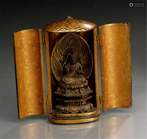 A LACQUERED WOOD ZUSHI, Japan, late Edo period, containing a carved wood sculpture of Kannon seated on a throne - Property from a Bavarian private collection - Minor wear, Kannon slightly rest.