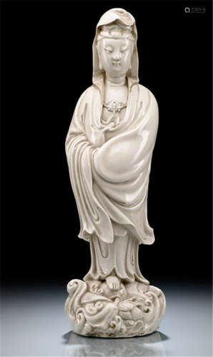 A DEHUA MODEL OF STANDING GUANYIN, China, Kangxi period-Provenance: Collection Adalbert Colsman (1886-1978) by descent to the present owner-Neck and head damaged, base filled with wood