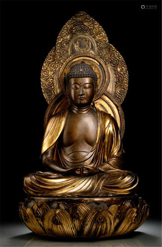 A PARCEL-GILT WOOD FIGURE OF AMIDA BUDDHA, Japan, Edo period, seated in vajrasana on a separate carved and associated lotus base with both hands in dhyanamudra, wearing monk's garment covering both shoulders, his face displaying a serene expression, inlaid downcast eyes, urna, his hair and ushnisha with curls and a mandorla behind - Property from a French private collection, acquired at Artcurial Drouot, Paris, 25th April 2008