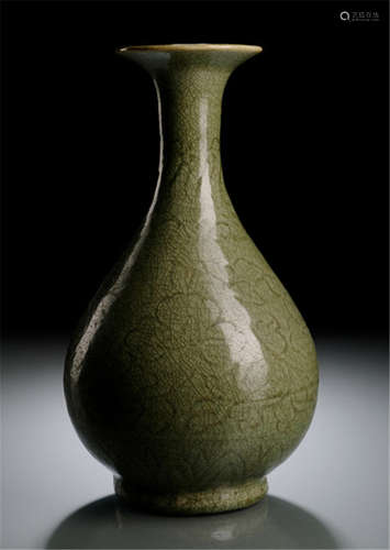 A CELADON-GLAZED BOTTLE VASE, China, probably Ming dynasty-Provenance: According to the present owner from an old German private collection-Minor wear