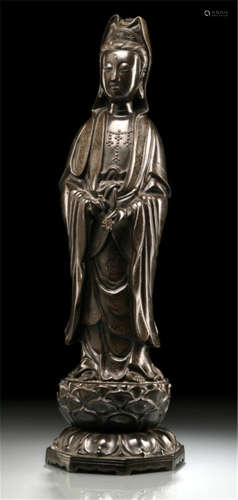 A SHISOU BRONZE FIGURE OF GUANYIN WITH SILVER WIRE INLAYS