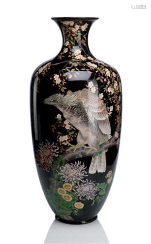 A LARGE CLOISONNÉ ENAMEL VASE, Japan, Meiji period, decorated with various flowers, a bird of prey perched on a flowering spray on black ground - Property from a European private collection, acquired before 2007 - Minor wear