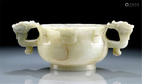 A PALE GREEN JADE CENSER WITH TWO DRAGON HANDLES, China, Ming dynasty, wood stand-Property from a French private collection, acquired at Bonhams, 12th May 2011, lot 74-Very slightly chipped