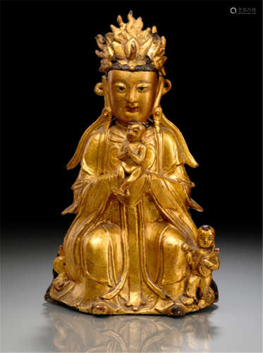A LACQUER-GILT BRONZE FIGURE OF SONGZI GUANYIN WITH TWO CHILDREN