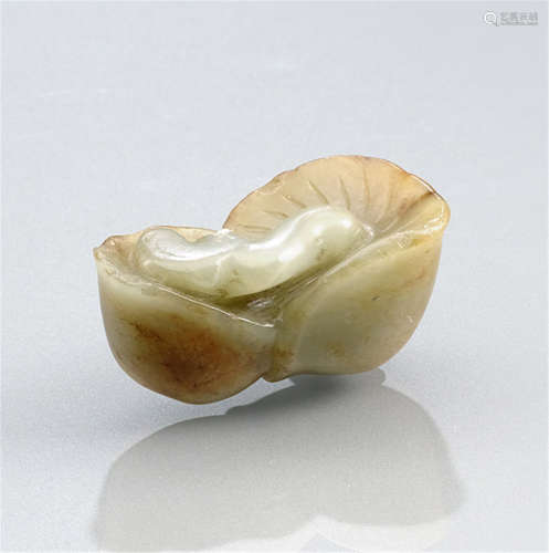 A CARVED JADE BRUSHREST IN THE SHAPE OF TWO FUNGI, China, 17th/18th ct