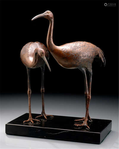 A COPPER MODEL OF A PAIR OF STANDING CRANES, Japan, Meiji period - Minor wear, mounted on stone plinth