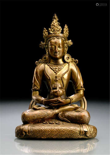 A BRONZE FIGUTRE OF SEATED AMITAYUS WITH GOLD- AND SILVER-INLAYS, Tibet, ca