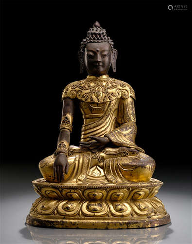 A PARCEL GILT-COPPER EMBOSSED FIGURE OF A BUDDHA, TIBETO-CHINESE, late 18th ct