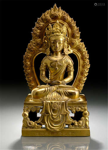 A GILT-BRONZE FIGURE OF AMITAYUS, CHINA, Qianlong mark and period, dated 1770