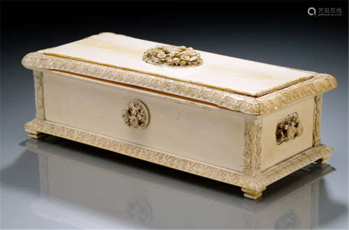AN IVORY CASKET WITH FLORAL HIGH RELIEF ORNAMENTS