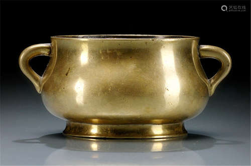 A SMALL BRONZE CENSER WITH TWO HANDLES