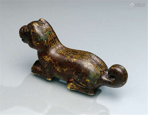 A BRONZE TIGER TALLY WITH GOLD INLAYS