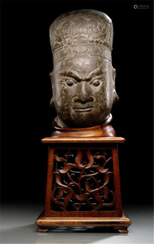 A VERY RARE STONE HEAD OF A KING OF HELL
