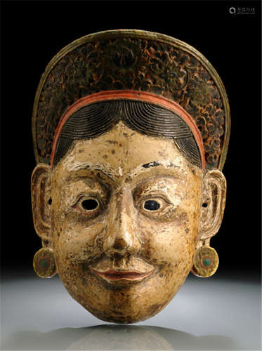 A PAINTED WOODEN CHAM MASK, possibly the goddess Tseringma, Tibet, ca