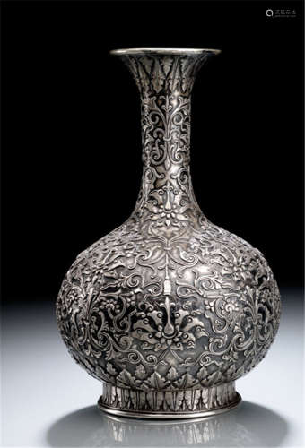 A FINE SILVER VASE WITH LOTOS RELIEF AND SCROLLWORK