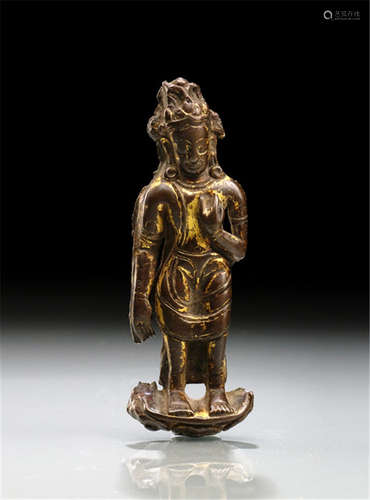 A BRONZE EMBOSSED PLAQUE DEPICTING A FIGURE OF PROBABLY A BODHISATTVA, TIBET, 14th/15th ct