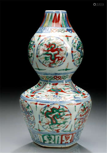 A DOUBLE-GOURD VASE WITH DRAGONS IN CARTOUCHES