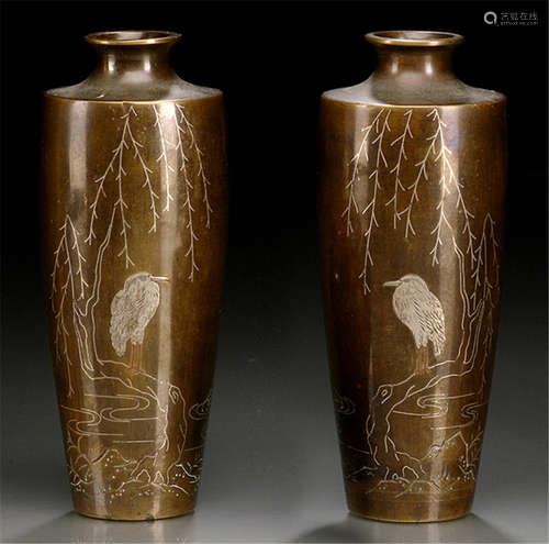 A PAIR OF BRONZE VASES WITH SILVER INLAID DECORATION OF A HERON NEXT TO A RUNNEL, Japan, Meiji period - Property from an old Austrian private collection - Minor wear due to age