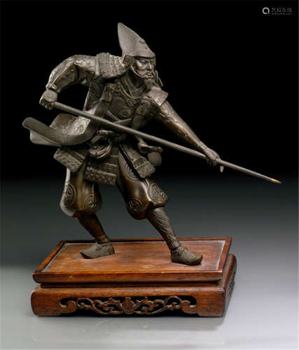 A BRONZE FIGURE OF A SAMURAI, Japan, signed Yôshimitsu, Meiji period, standing in bent posture, with concentrated facial expression holding a spear - Former property from an old Berlin private collection - Minor wear, mounted on wood stand