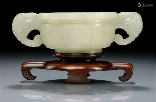 A JADE CENSER WITH TWO HANDLES IN THE SHAPE OF ELEPHANTS' HEADS