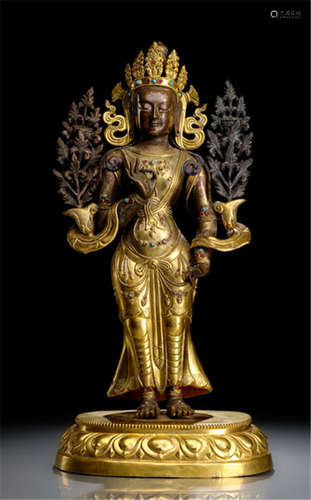 A PARCEL GILT-COPPER EMBOSSED FIGURE OF MANJUSHRI, TIBETO-CHINESE, 18th/19th ct